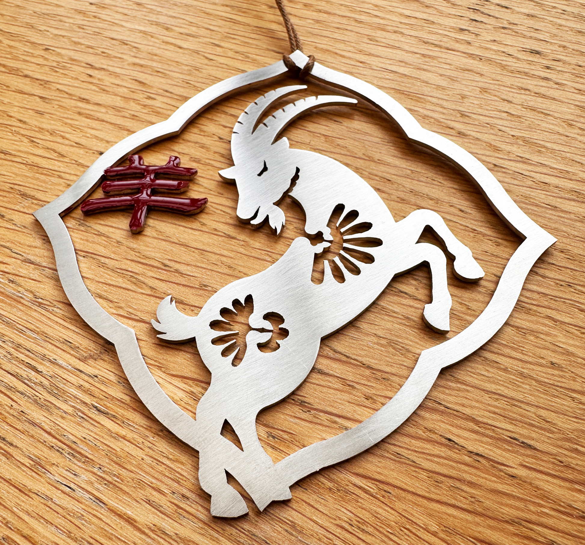 a metal ornament with a horse on it