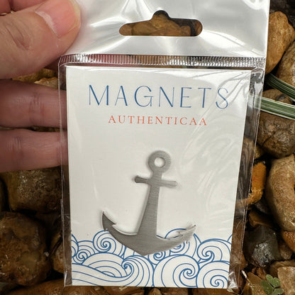 Anchor magnet made of stainless steel placed on an illustrated eco friendly card and in a plastic pouch