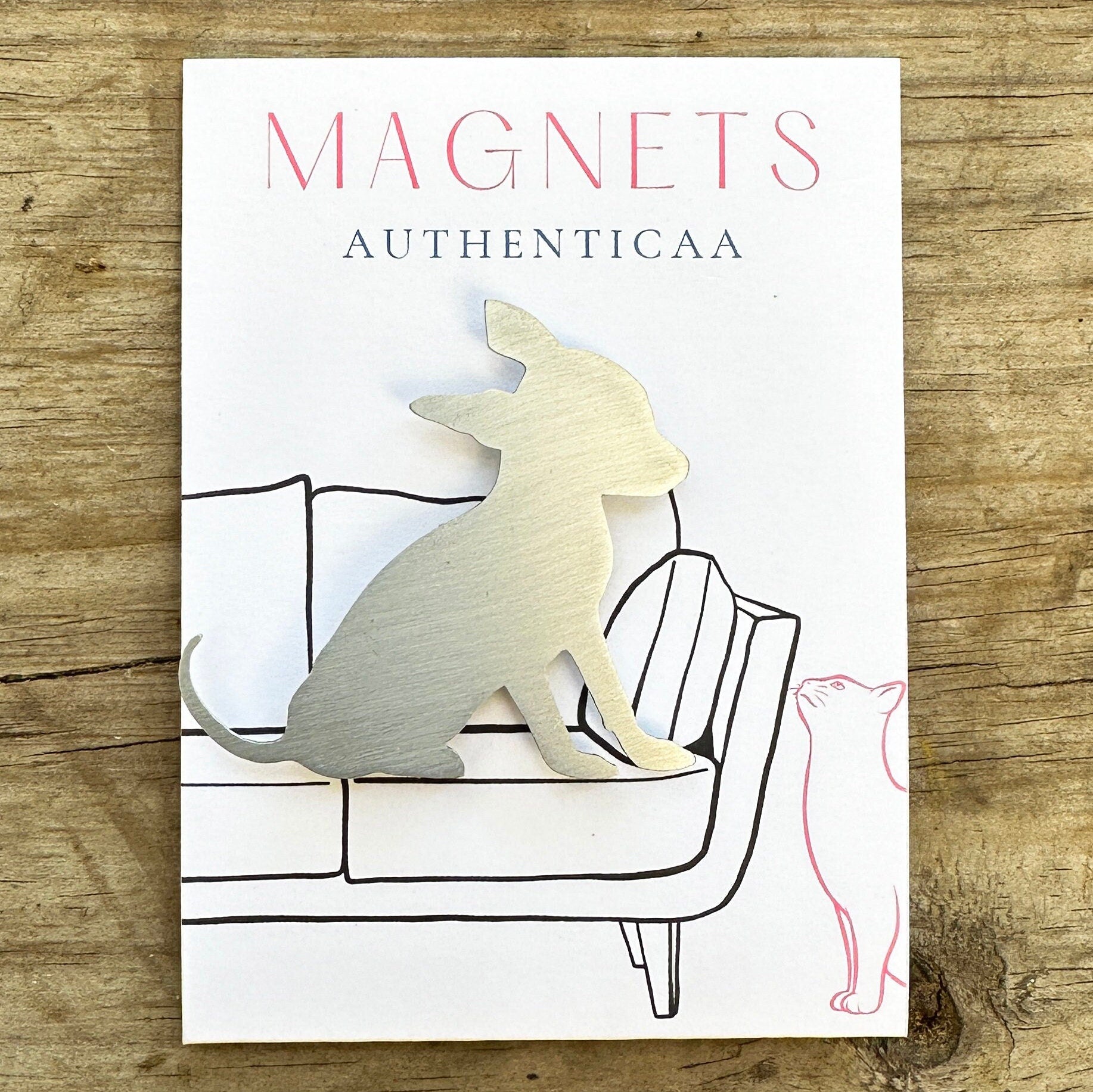 chihuahua dog sitting , magnet made of stainless steel and a strong magnet. Placed on an illustrated card