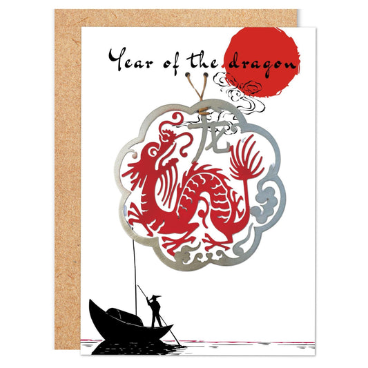 a chinese new year card with a dragon on a boat